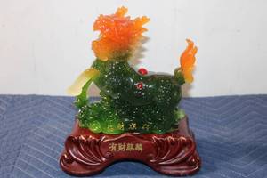 lot 735 image: Jade-Like Resin Dragon Horse Figurine on Wooden Base