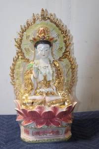 lot 744 image: Porcelain Guan Yin Figurine with Gold Accents