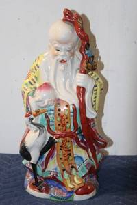 lot 767 image: Large Chinese Porcelain Figurine of Immortal Holding Peach and Crane