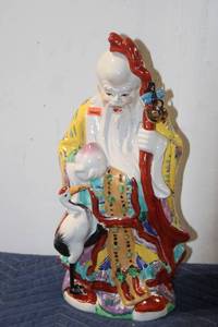 lot 768 image: Vintage Asian Porcelain Figurine with Crane and Staff