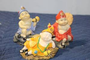 lot 777 image: Set of 3 Feng Shui Monk Figurines with Orange, Red and Blue Outfits