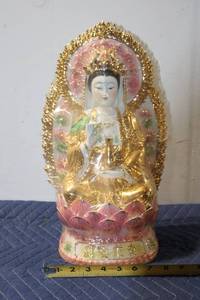 lot 792 image: Gilded Porcelain Statue of Guanyin with Intricate Floral Motif
