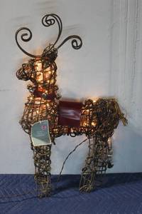 lot 857 image: Illuminated Wicker Reindeer Figure with Bells and Saddle