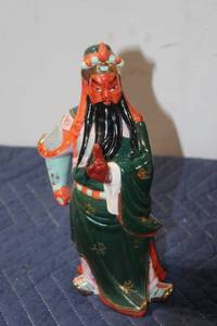 lot 879 image: Vintage Asian Warrior Porcelain Figurine