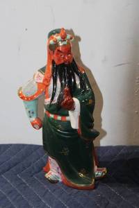lot 880 image: Porcelain Figurine of Warrior with Intricate Detail