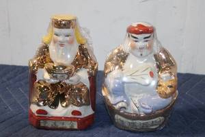 lot 900 image: Pair of Eastern Deity Porcelain Figurines