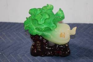 lot 901 image: Cabbage Sculpture on Carved Wooden Stand