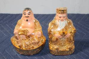 lot 905 image: Pair of Gold-Toned God Statues with Intricate Designs