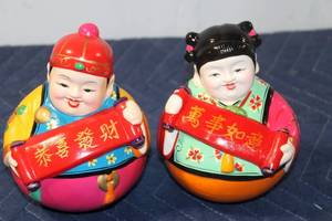 lot 915 image: Pair of Traditional Chinese Prosperity Figurines