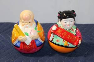lot 916 image: Pair of Roly Poly Figurines featuring Immortal Characters
