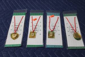 lot 950 image: Set of 4 Chinese Feng Shui Amulets with Red Cord