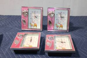 lot 974 image: Set of 4 Hello Kitty Pink Wall Clocks with Decorative Rose