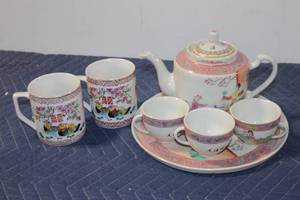 lot 975 image: Vintage Asian Porcelain Tea Set with Teapot, Tray, and Cups