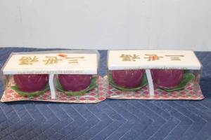 lot 1014 image: Set of 2 Decorative Lotus Flower Candles in Original Packaging