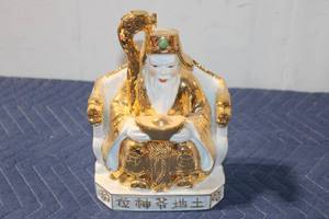 lot 1102 image: Porcelain Chinese Figurine with Gold Accents and Intricate Detailing