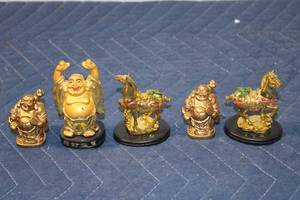 lot 1152 image: Set of 3 Laughing Buddha Figurines and 2 Gold Horse Statues