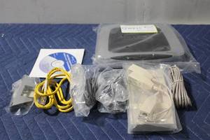 lot 1217 image: Qwest Wireless Gateway with Installation CDs and Cables