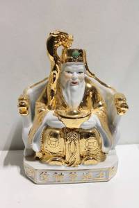 lot 663 image: Golden Deity Figurine with Intricate Details