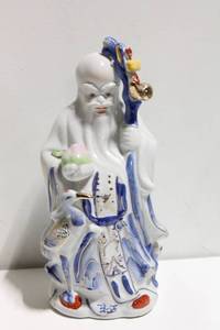 lot 673 image: 14-Inch Porcelain Figurine of Shou, God of Longevity