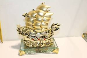 lot 685 image: Decorative Gold Ship Figurine with Glass Base