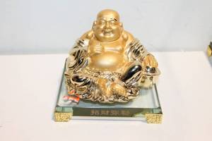 lot 686 image: Golden Laughing Buddha Figurine on Glass Base