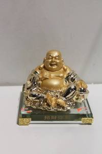 lot 687 image: Golden Laughing Buddha Figurine with Glass Base