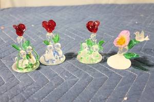 lot 1055 image: Collection of 4 Handcrafted Glass Figurines with Floral Themes