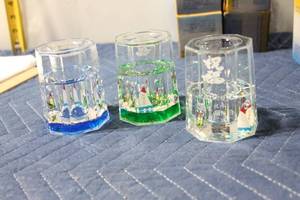 lot 1063 image: Set of 3 Sailboat Themed Hexagonal Liquid Motion Tumblers