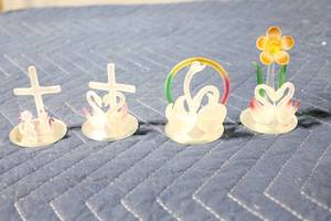 lot 1081 image: Set of 4 Frosted Glass Swan Figurines with Cross, Flower, and Rainbow Accents