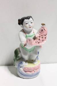 lot 1116 image: Vintage Porcelain Figurine of Child with Fish