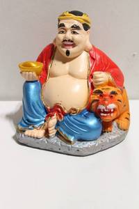 lot 1181 image: Colorful Buddha Figurine with Tiger and Gold Ingot