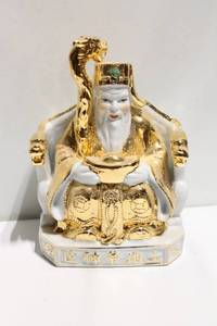 lot 1186 image: Gold and White Porcelain Deity Figurine with Dragon Design