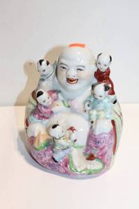 lot 1202 image: Vintage Porcelain Laughing Buddha with Children Figurine