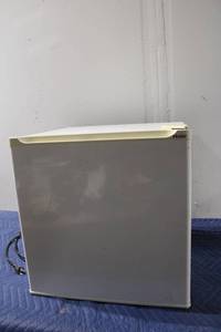 lot 1261 image: Used Haier Mini Fridge with Freezer Compartment