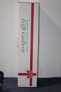 lot 1286 image: Gift Wrapping Set with Ribbons, Bows, and Assorted Wrapping Papers