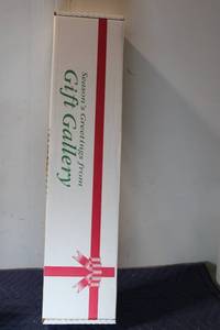 lot 1296 image: Gift Wrapping Set with Bows, Ribbons, and Gift Wrap Rolls