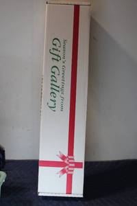 lot 1300 image: Holiday Gift Wrapping Set with Wrapping Paper, Bows, and Ribbon