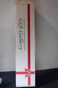 lot 1303 image: Gift Wrapping Kit with 5 Rolls of Paper and Assorted Bows