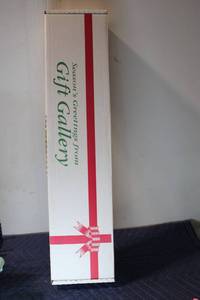 lot 1304 image: Holiday Gift Wrapping Set with Paper Rolls, Bows, and Ribbon