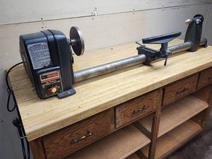 lot 58 image: Craftsman 12 Wood Lathe Mounted on a Rolling Tool Storage Cabinet