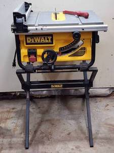 lot 33 image: Dewalt Contractors 10 Table Saw with Stand
