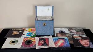 lot 316 image: Vintage 45s and Carrying Case