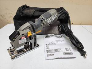 lot 152 image: Rockwell Electric Mini Circular Saw with laser