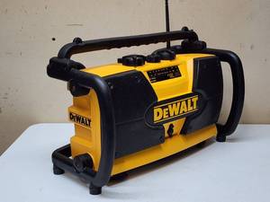 lot 35 image: Dewalt Contractors AMFM Radio Battery Charger Unit