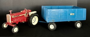 lot 359 image: Vintage Turbo Farmall RX 101 Tractor and Blue Trailer