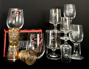 lot 332 image: (6) United Airlines Brandy Glasses and New Riedel Wine Glasses