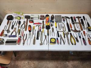 lot 412 image: Tabletop of Assorted Garage Tools