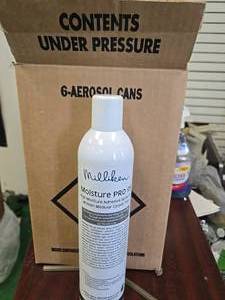 A box containing 6Aerosol Cans