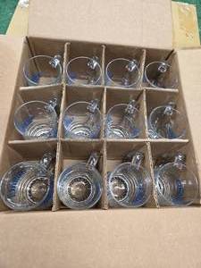 A Box Containing a dozen of Clear huge and heavy glass Mugs