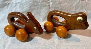 lot 12 image: Vintage CWS Company Wooden Roller Toys